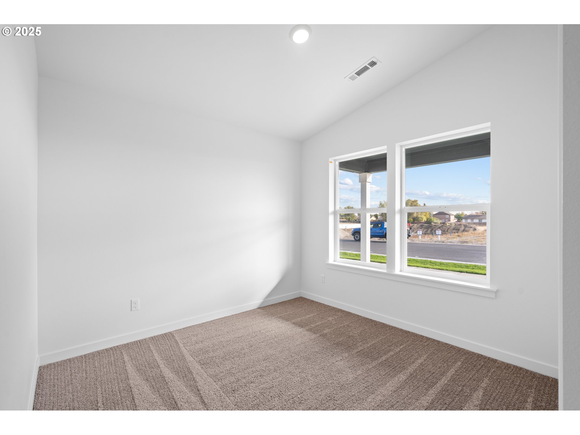 148 Southwest Eagle Drive Boardman, OR 97818 - Photo 15 of 27 a view of an empty room with a window