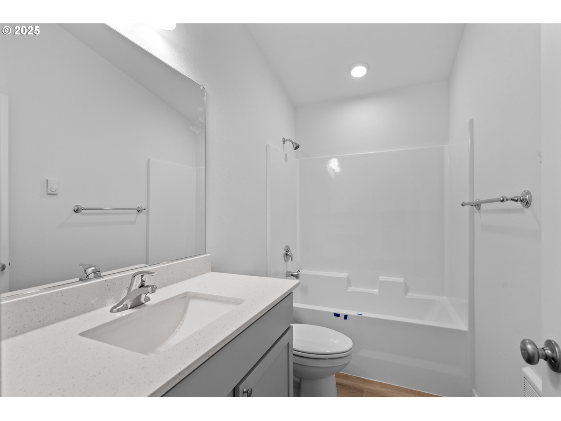 148 Southwest Eagle Drive Boardman, OR 97818 - Photo 16 of 27 a bathroom with a sink a toilet a shower and a mirror