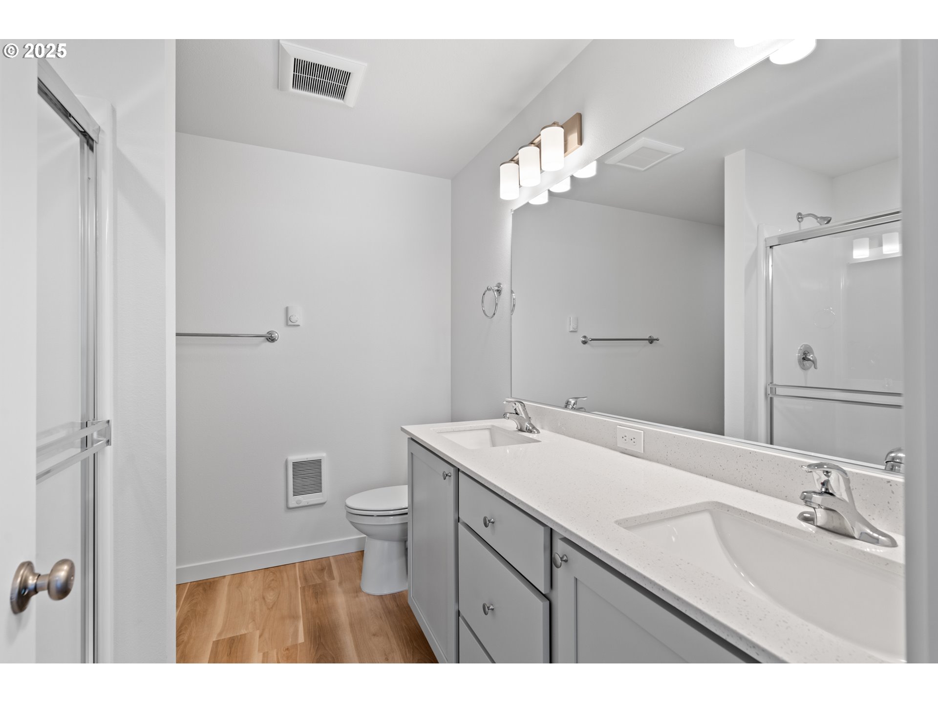 148 Southwest Eagle Drive Boardman, OR 97818 - Photo 10 of 27 a bathroom with a sink a toilet and a mirror