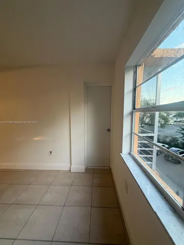a bathroom with a sink a mirror and a vanity