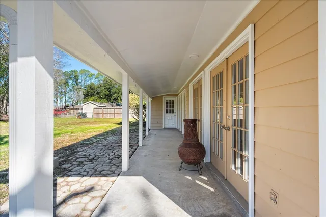 a view of a porch with furniture