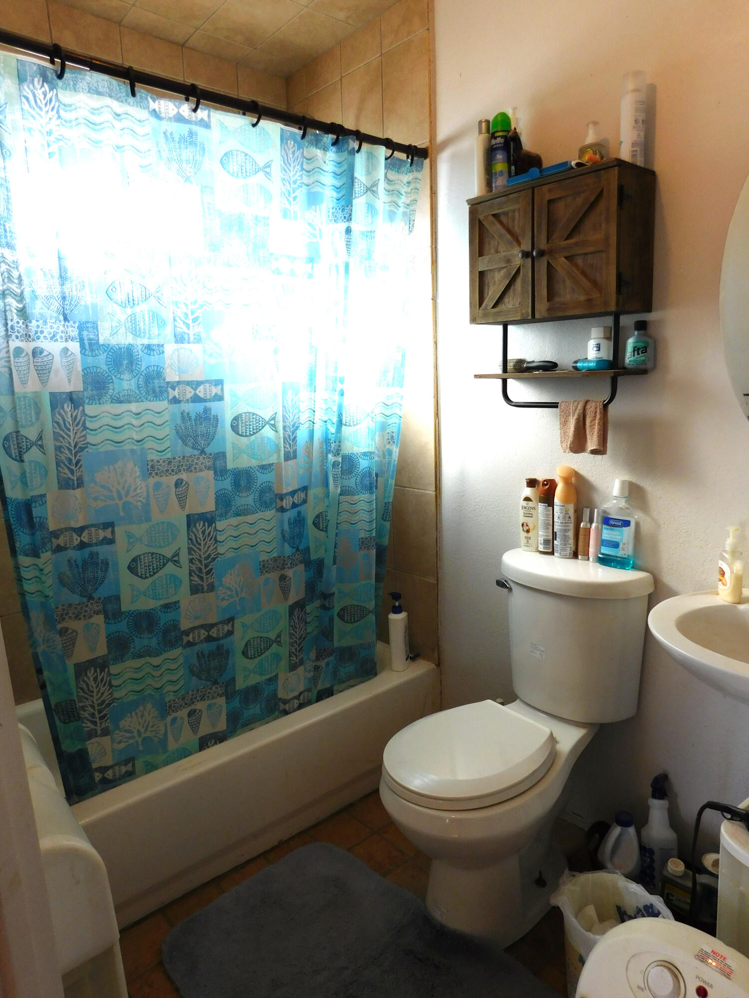 431 County Road 225 Muleshoe, TX 79347 - Photo 13 of 21 a bathroom with a toilet a sink and a shower