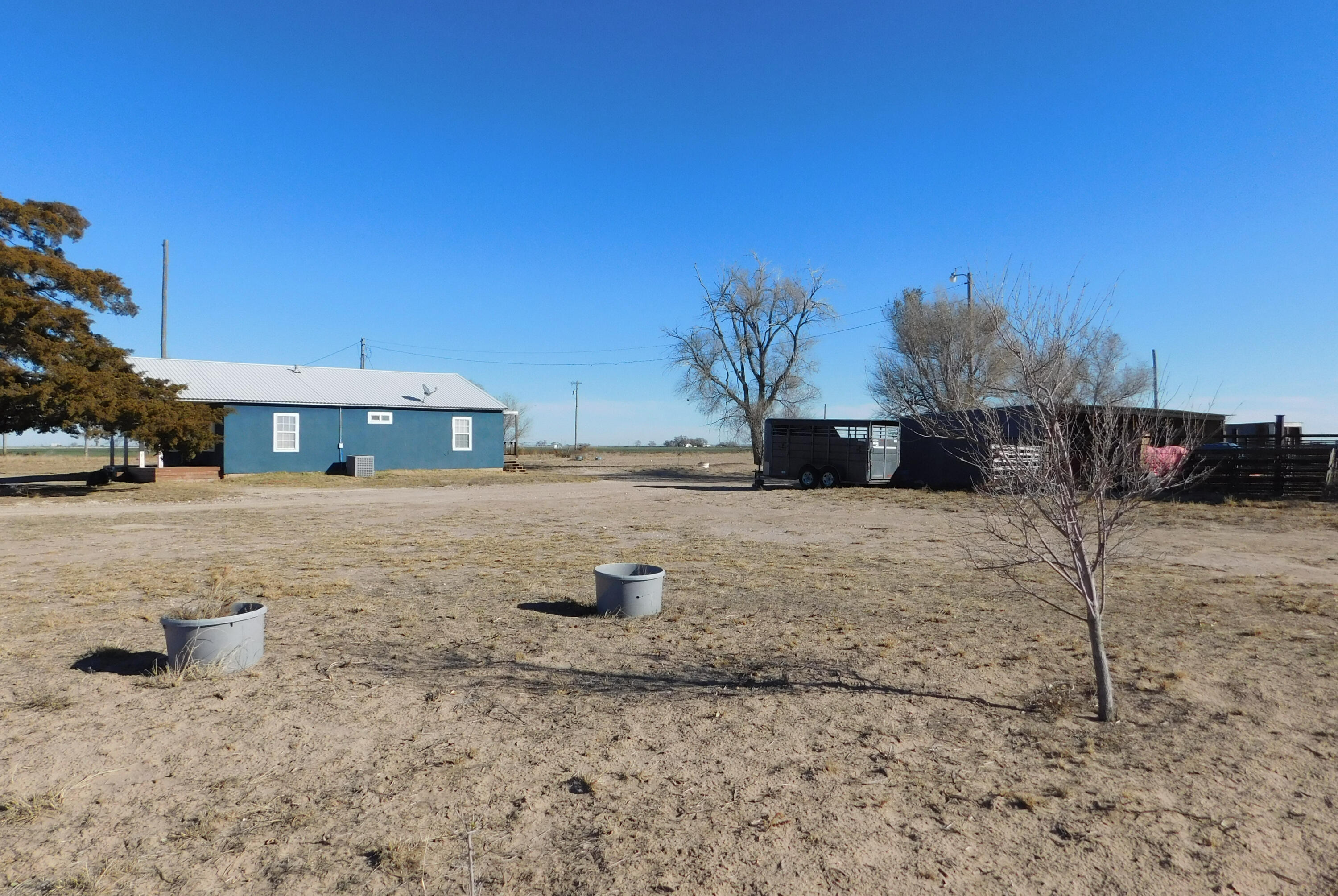 431 County Road 225 Muleshoe, TX 79347 - Photo 20 of 21 a view of a house with a yard