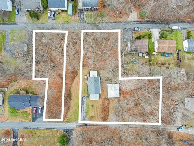 a view of outdoor living space with patio furniture