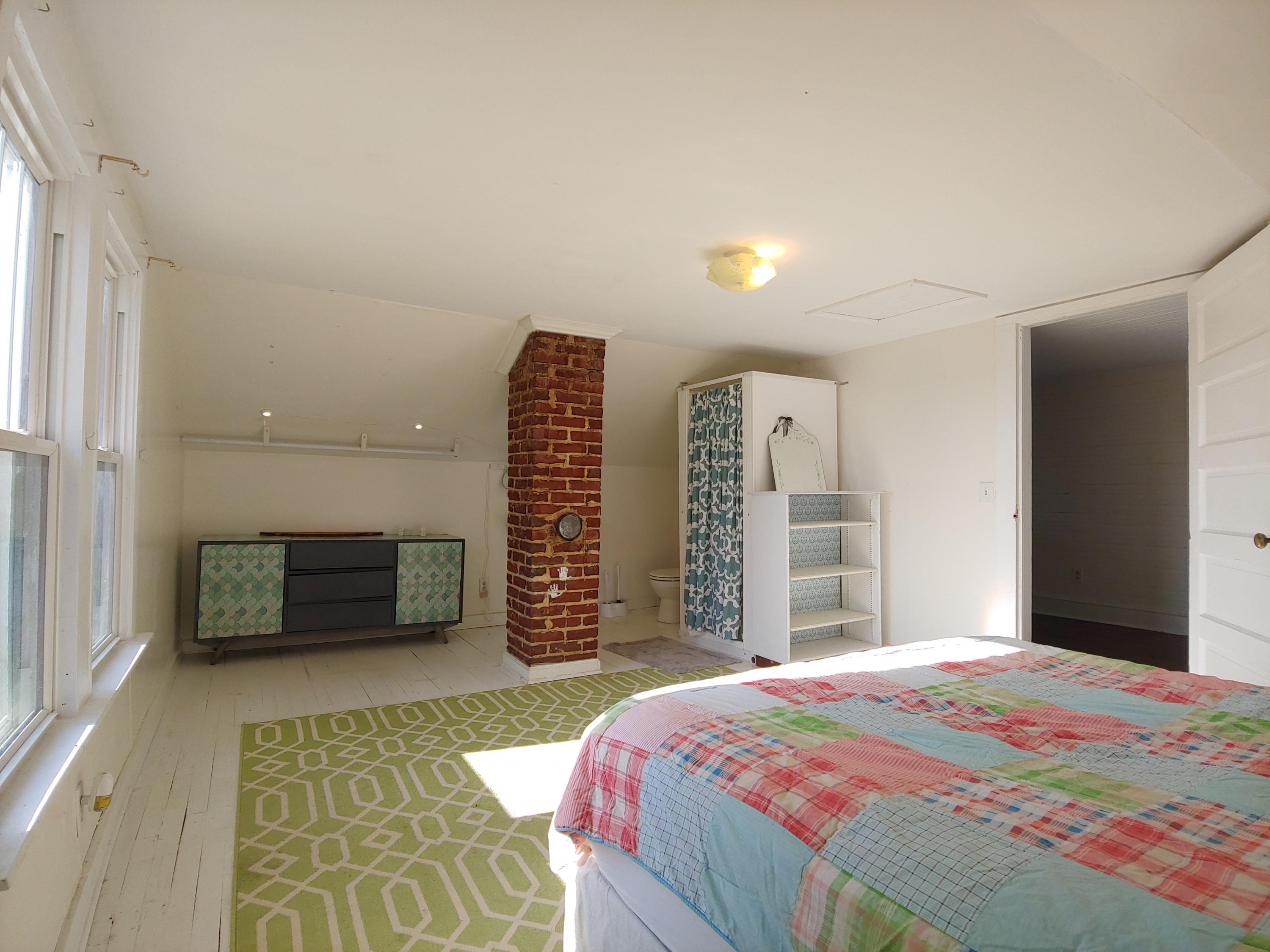9313 Museville Road Sandy Level, VA 24161 - Photo 14 of 41 a bedroom with a bed and a couch