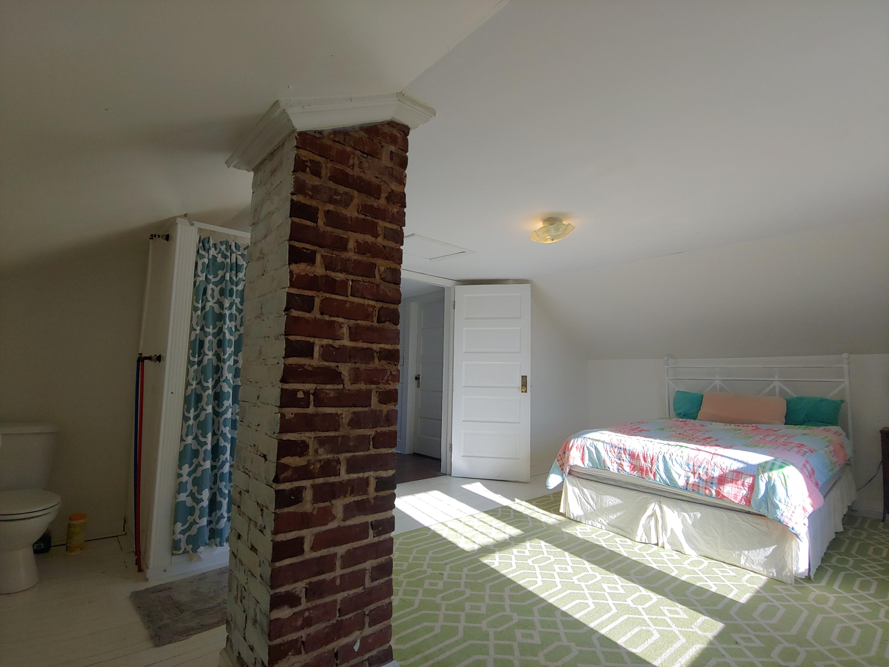 9313 Museville Road Sandy Level, VA 24161 - Photo 15 of 41 a bedroom with a bed and a window