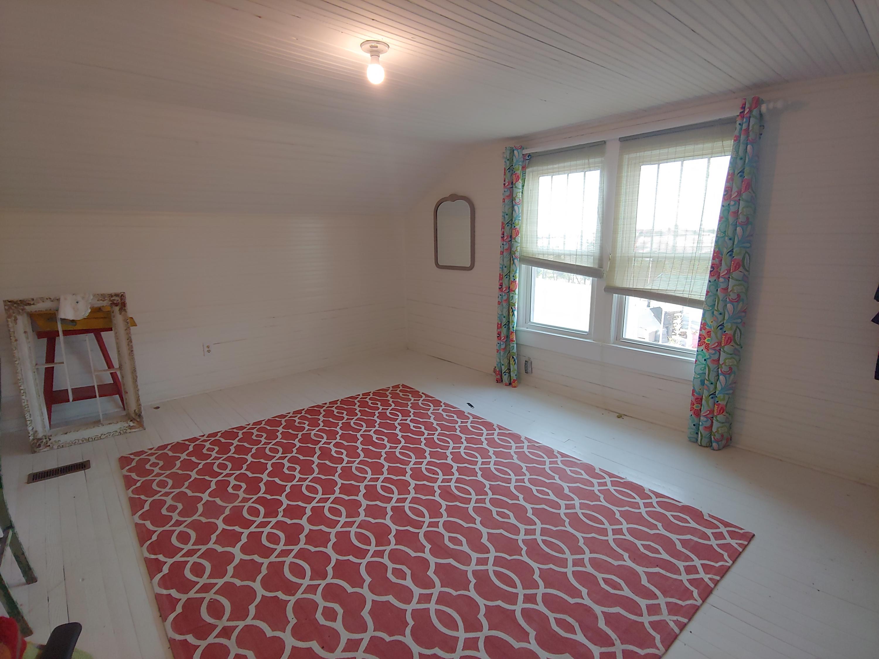 9313 Museville Road Sandy Level, VA 24161 - Photo 16 of 41 a bedroom with a bed and a window