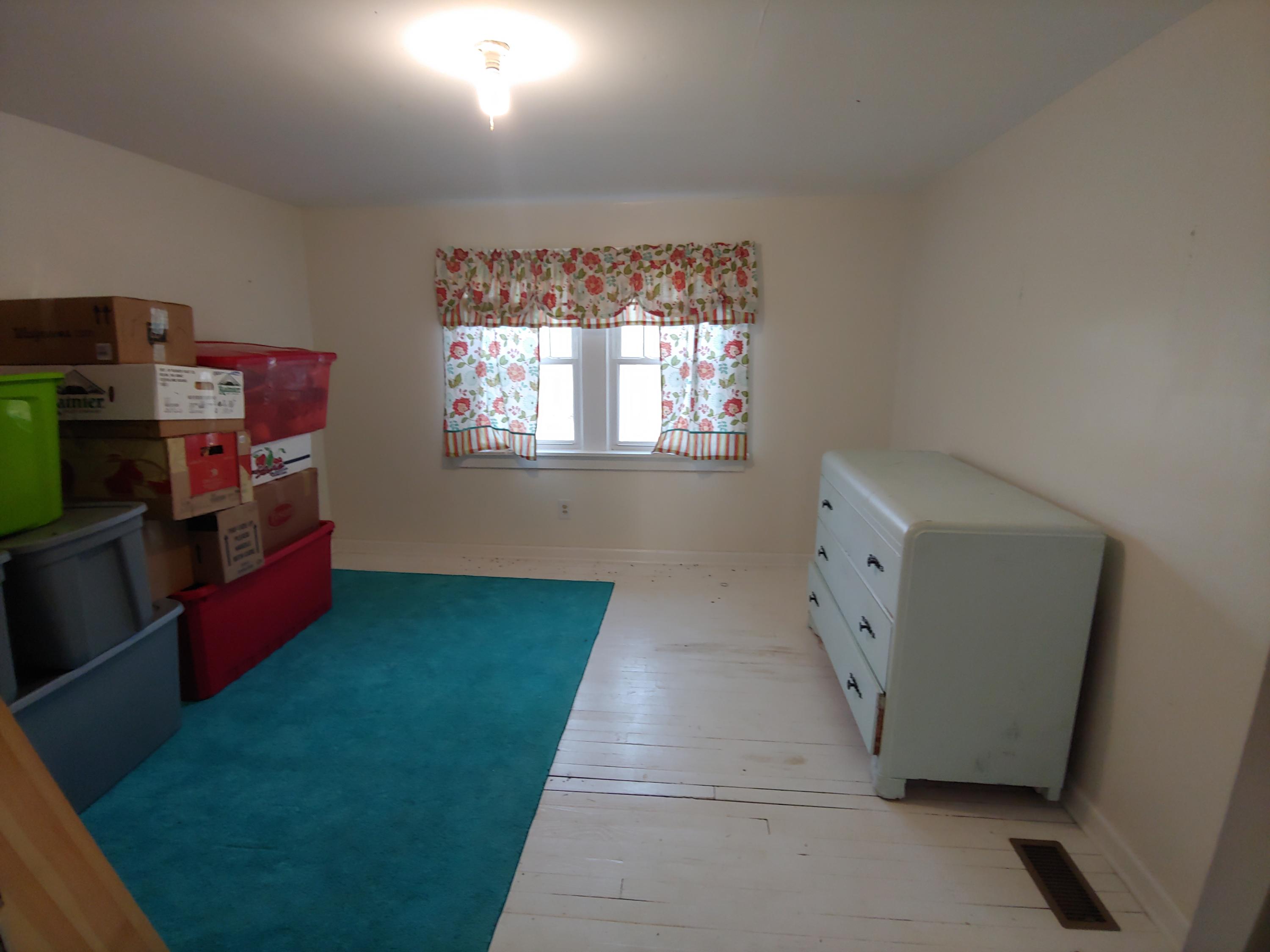 9313 Museville Road Sandy Level, VA 24161 - Photo 17 of 41 a living room with furniture and a window