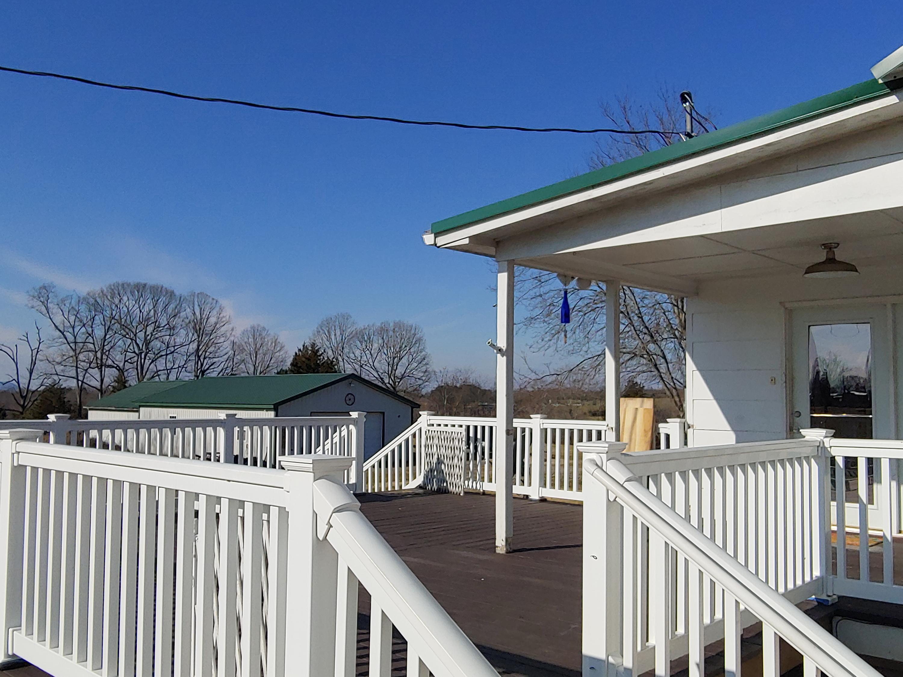 9313 Museville Road Sandy Level, VA 24161 - Photo 20 of 41 a view of a porch and deck