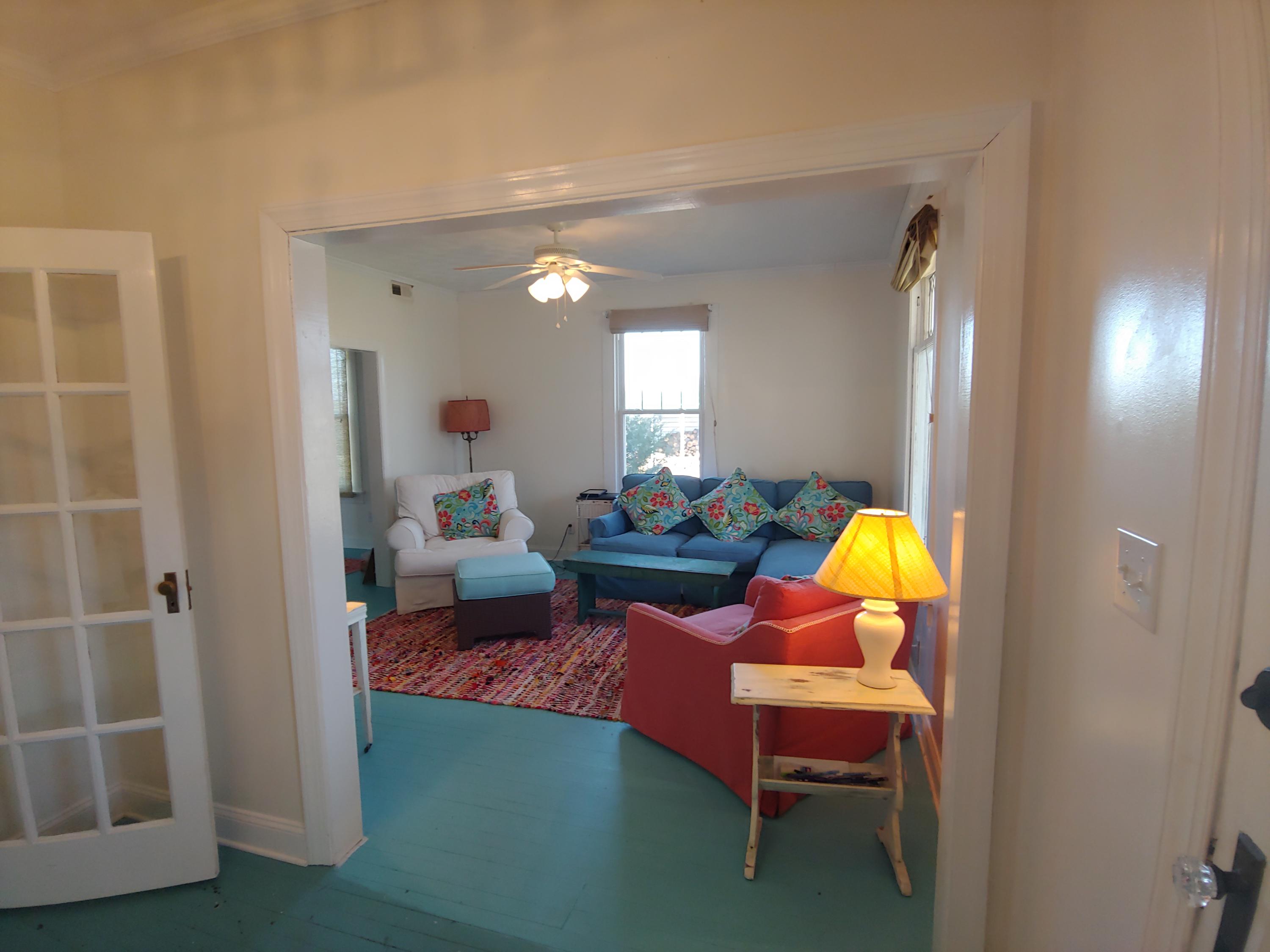 9313 Museville Road Sandy Level, VA 24161 - Photo 3 of 41 a living room with furniture and a lamp
