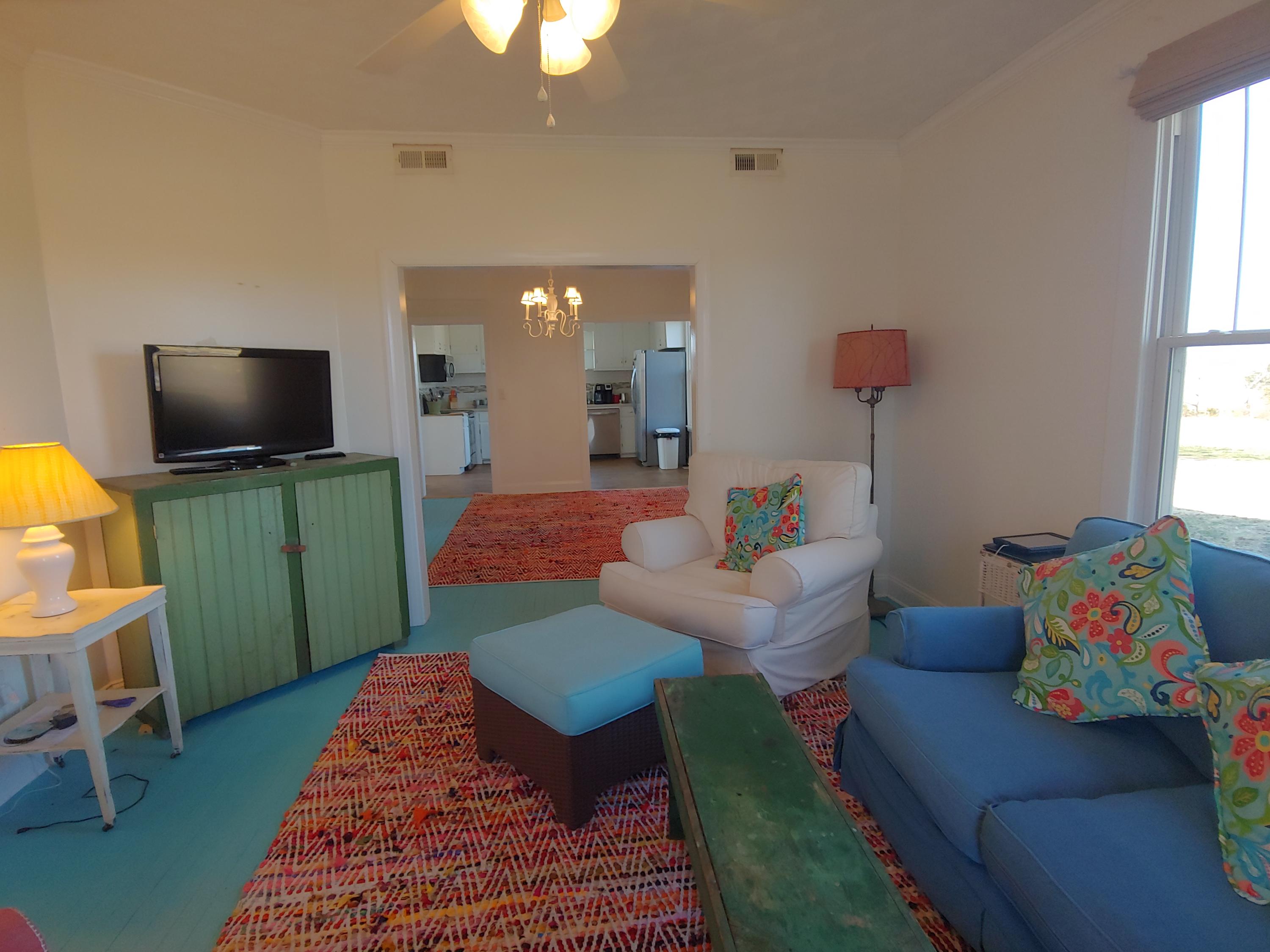 9313 Museville Road Sandy Level, VA 24161 - Photo 28 of 41 a living room with furniture and a flat screen tv