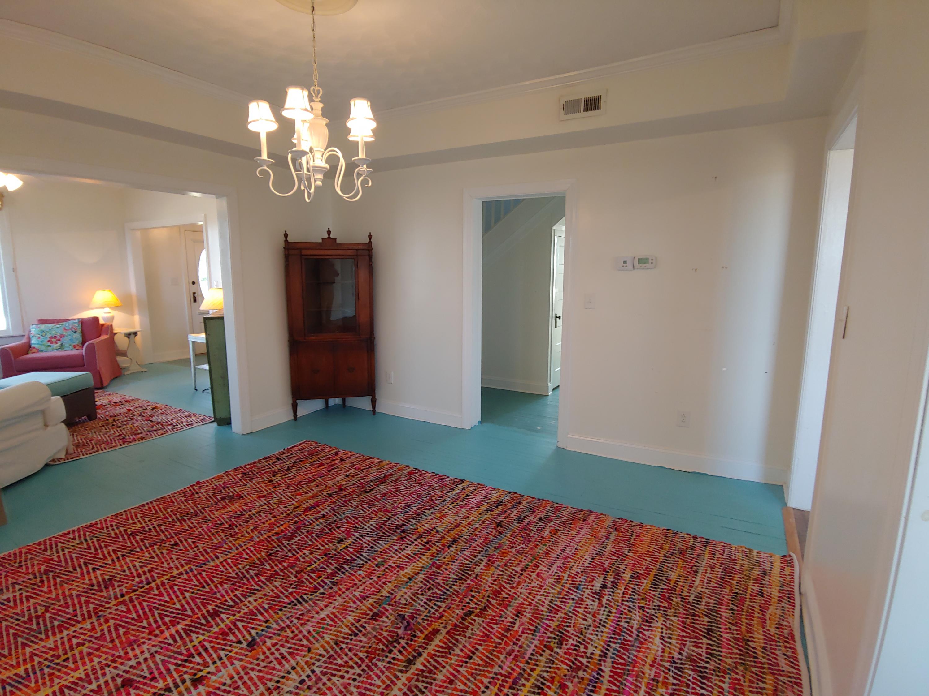 9313 Museville Road Sandy Level, VA 24161 - Photo 29 of 41 a bedroom with a bed and wooden floor
