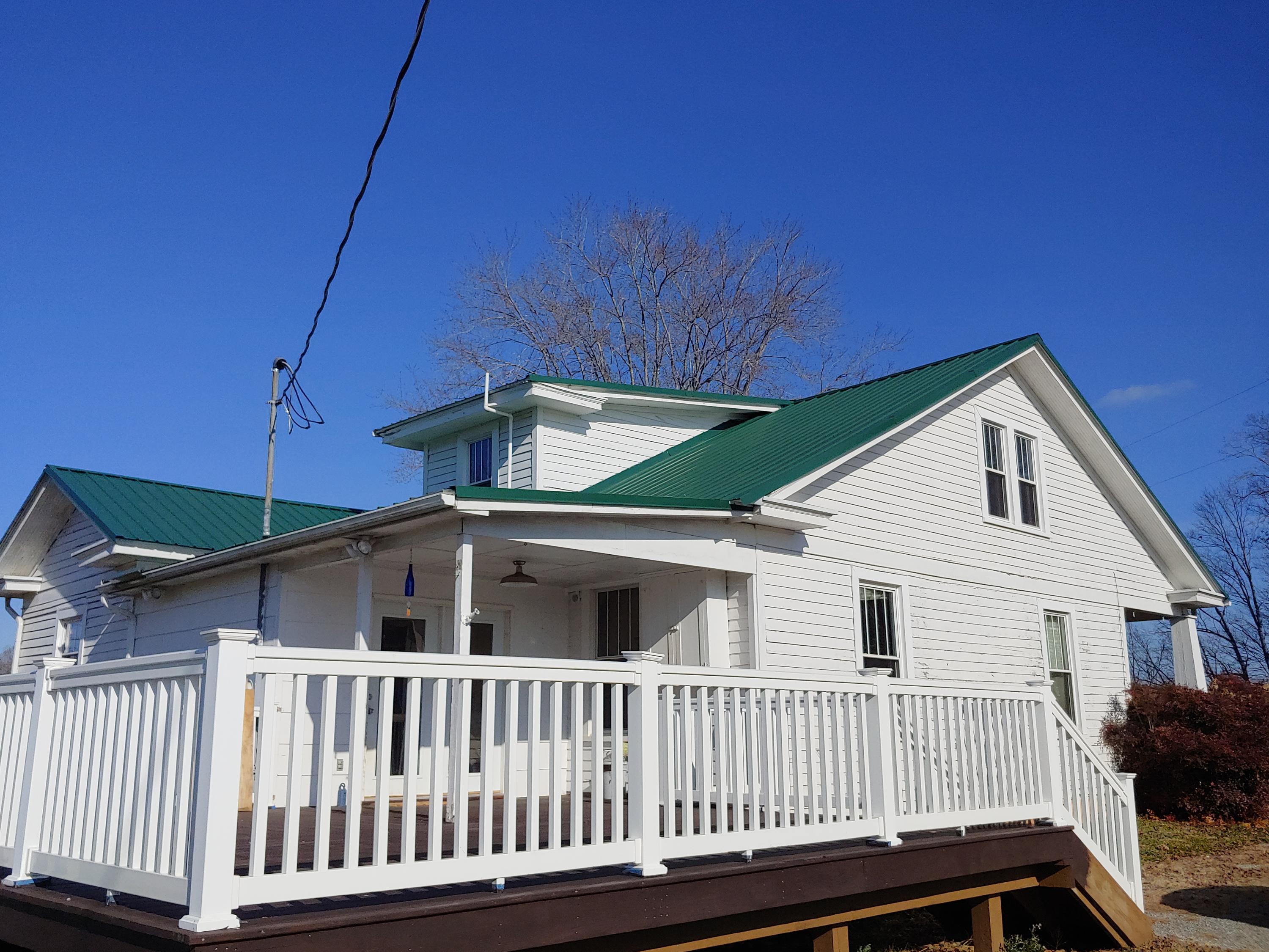 9313 Museville Road Sandy Level, VA 24161 - Photo 35 of 41 a view of a house with a deck