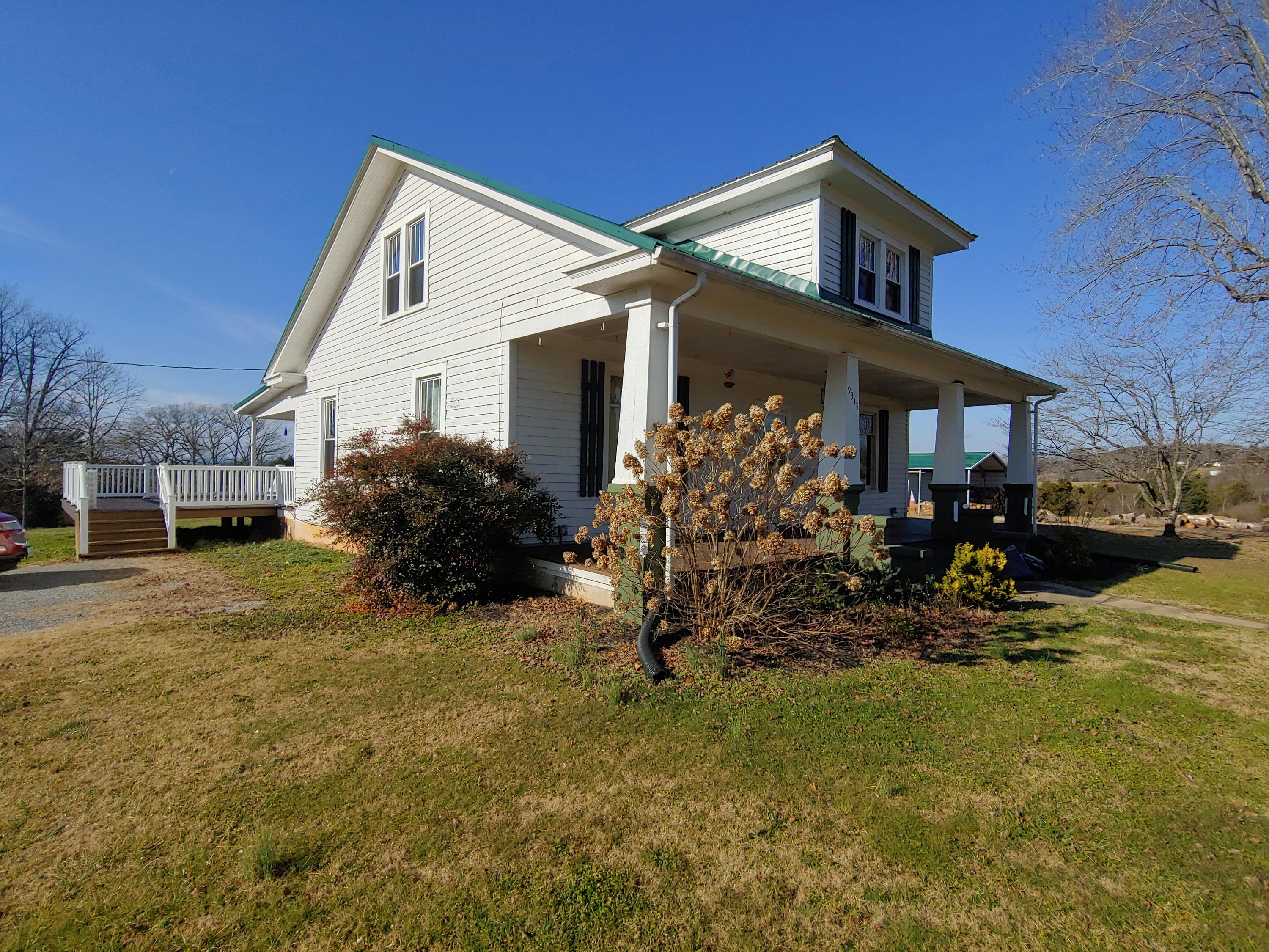 9313 Museville Road Sandy Level, VA 24161 - Photo 41 of 41 a front view of a house with garden
