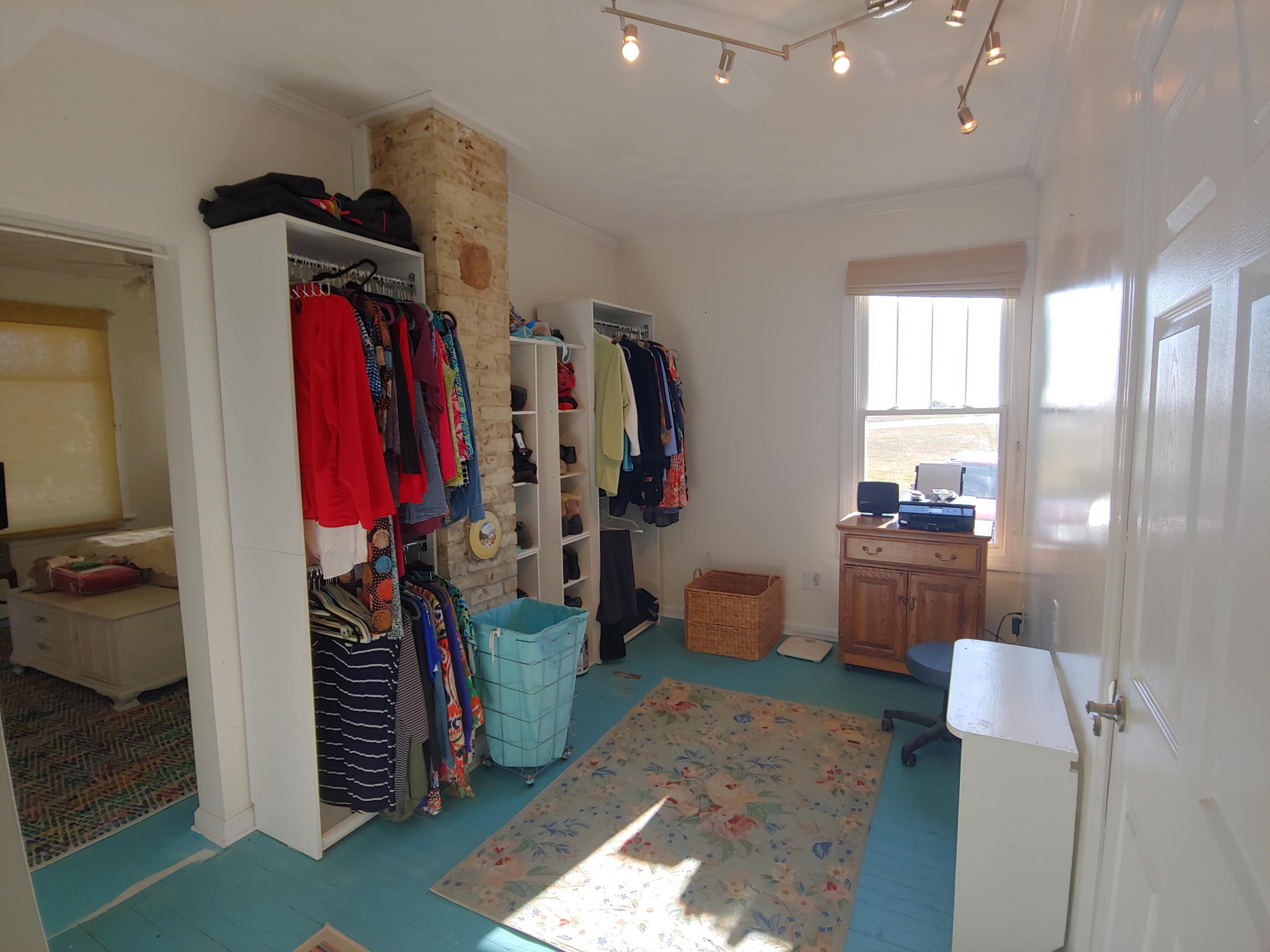 9313 Museville Road Sandy Level, VA 24161 - Photo 9 of 41 a view of walk in closet with clothes and shoes