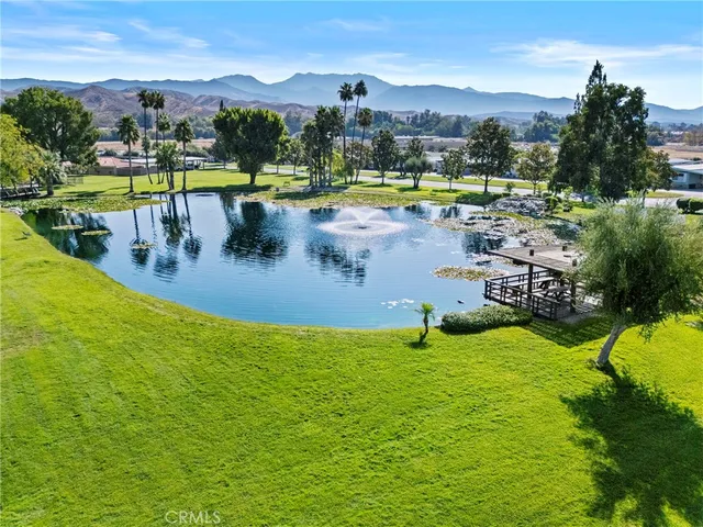 a view of a swimming pool with a lake view