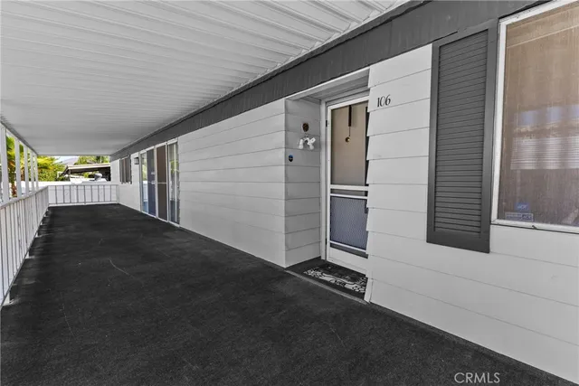 a view of backyard with seating space