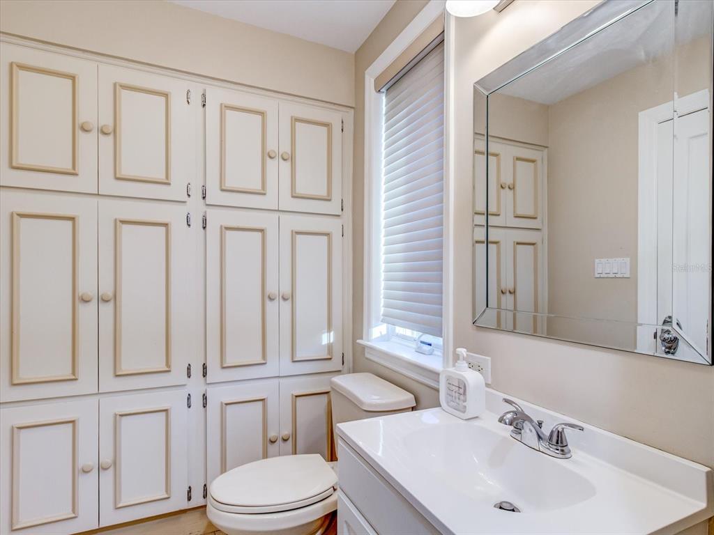 518 Riverside Drive Tarpon Springs, FL 34689 - Photo 29 of 82 a bathroom with a sink a toilet and tub