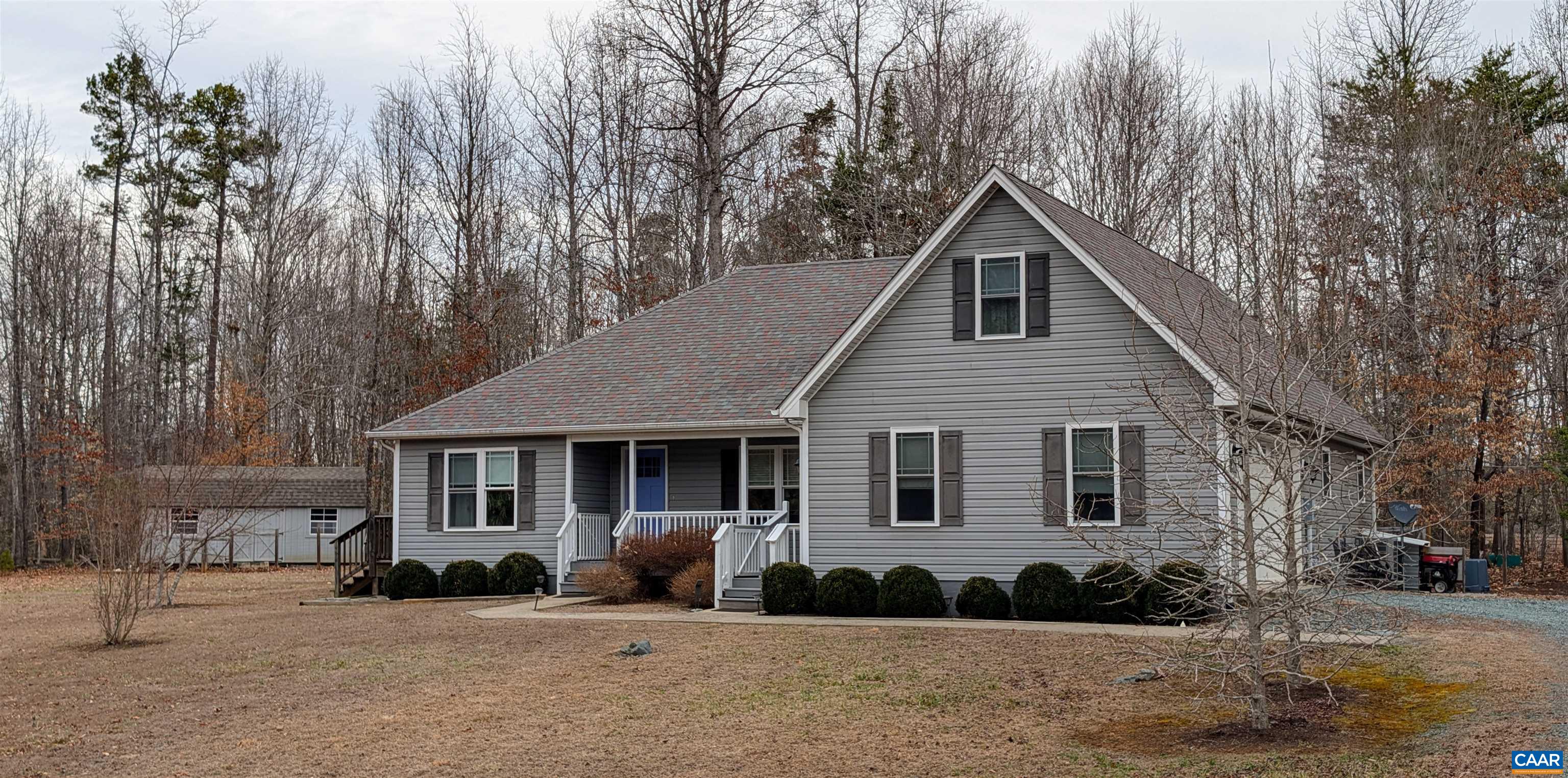 4489 Campbell Road Troy, VA 22974 - Photo 1 of 33 a front view of a house with a yard