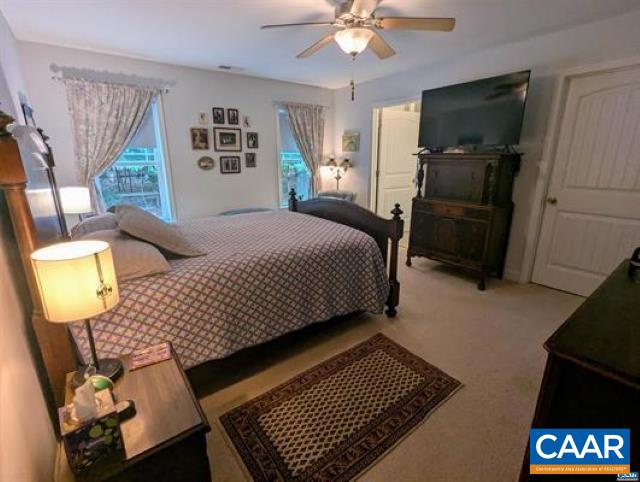 4489 Campbell Road Troy, VA 22974 - Photo 13 of 33 a bedroom with a bed and flat screen tv