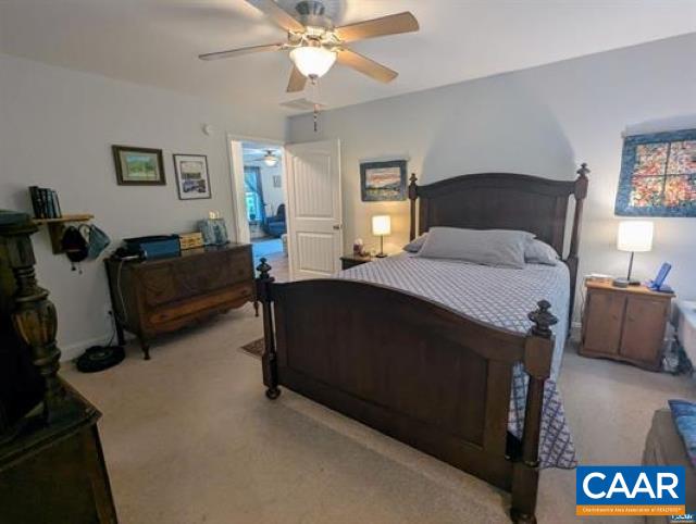 4489 Campbell Road Troy, VA 22974 - Photo 14 of 33 a bedroom with a bed and a couch