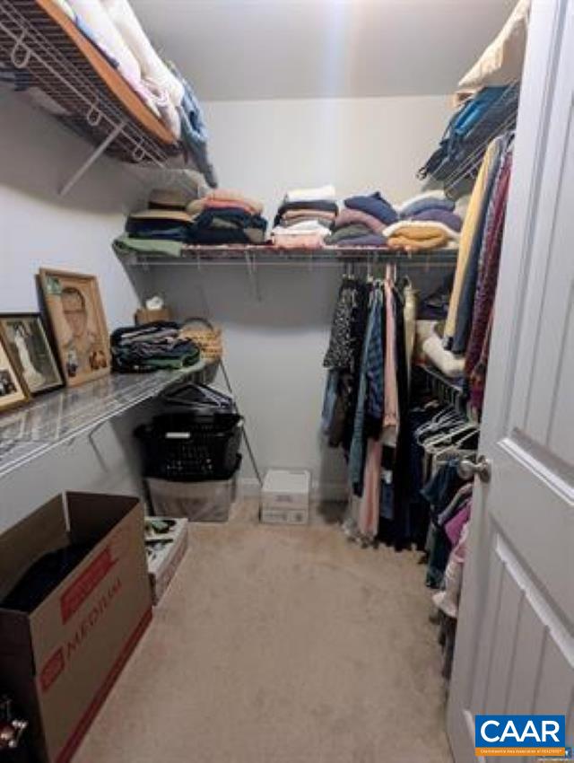 4489 Campbell Road Troy, VA 22974 - Photo 15 of 33 a view of walk in closet with clothes and shoes