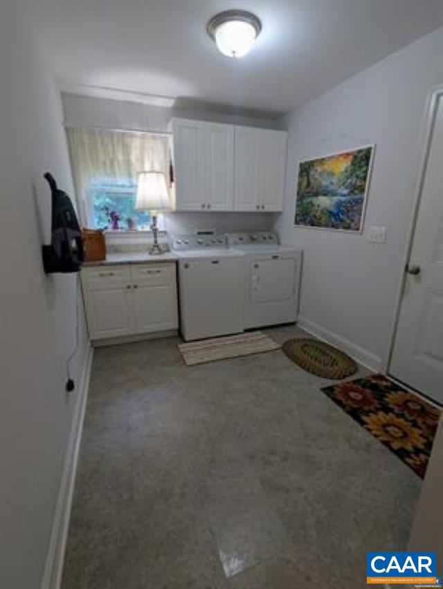4489 Campbell Road Troy, VA 22974 - Photo 21 of 33 a room with a sink a window and cabinets