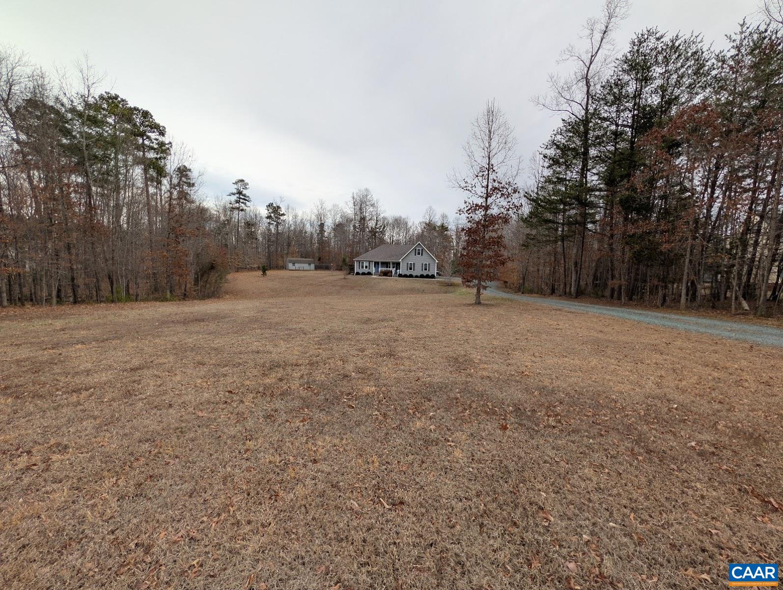 4489 Campbell Road Troy, VA 22974 - Photo 33 of 33 a backyard of a house with trees