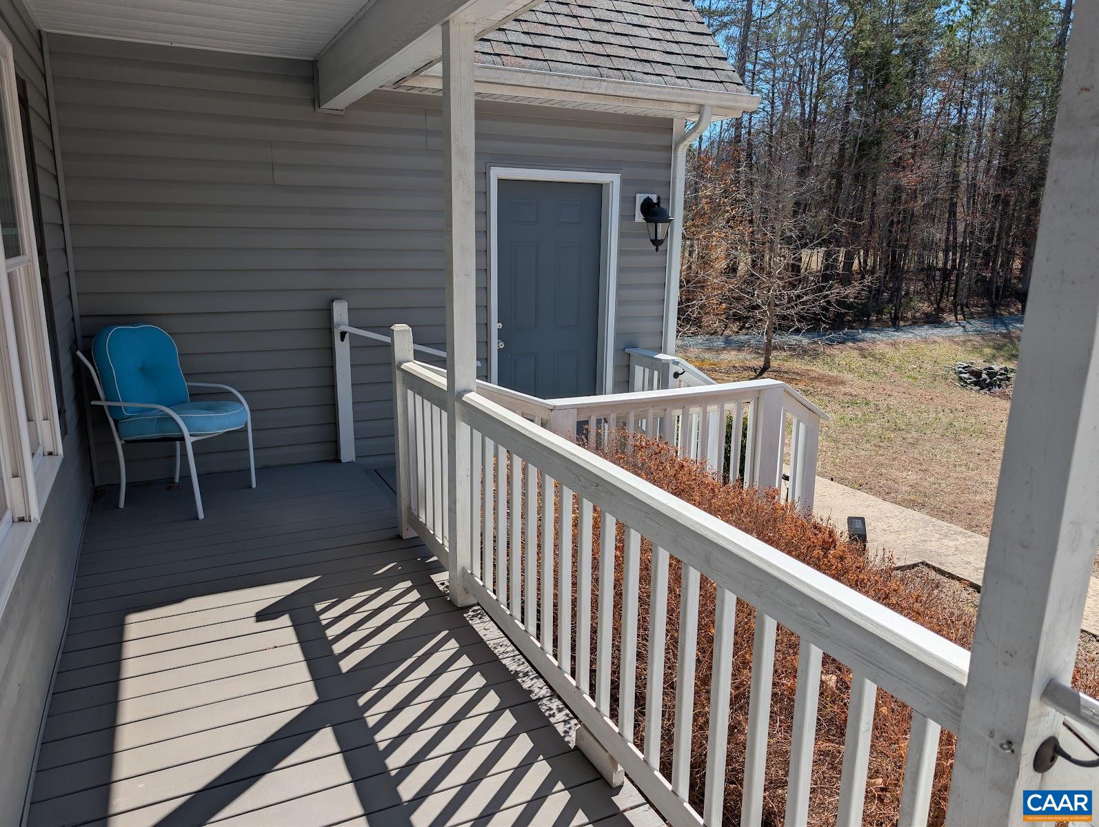 4489 Campbell Road Troy, VA 22974 - Photo 4 of 33 a view of a patio with a table and chairs