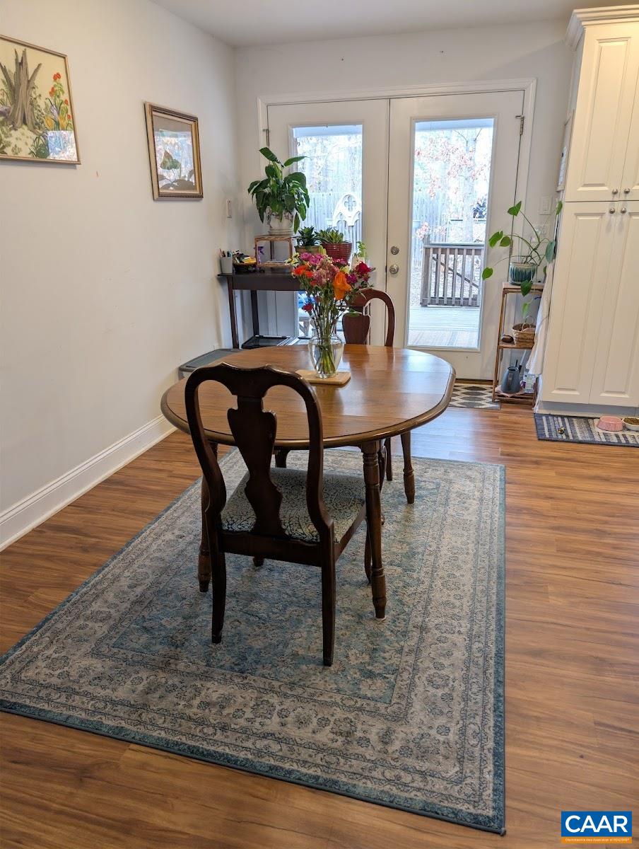 4489 Campbell Road Troy, VA 22974 - Photo 6 of 33 a view of a dining room with furniture window and wooden floor