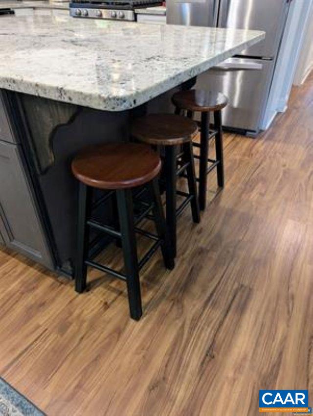 4489 Campbell Road Troy, VA 22974 - Photo 9 of 33 a view of a dining room with furniture and wooden floor