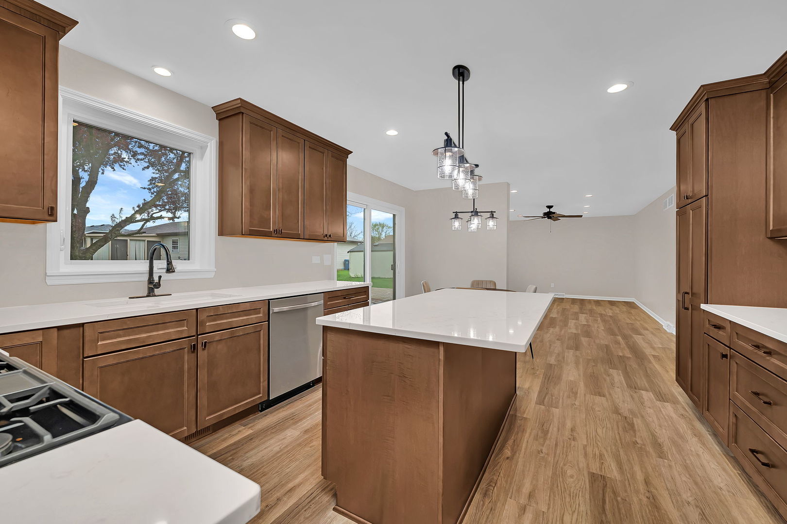 2380 Chestnut Lane Morris, IL 60450 - Photo 12 of 43 a kitchen with kitchen island a counter top space a sink stainless steel appliances and cabinets