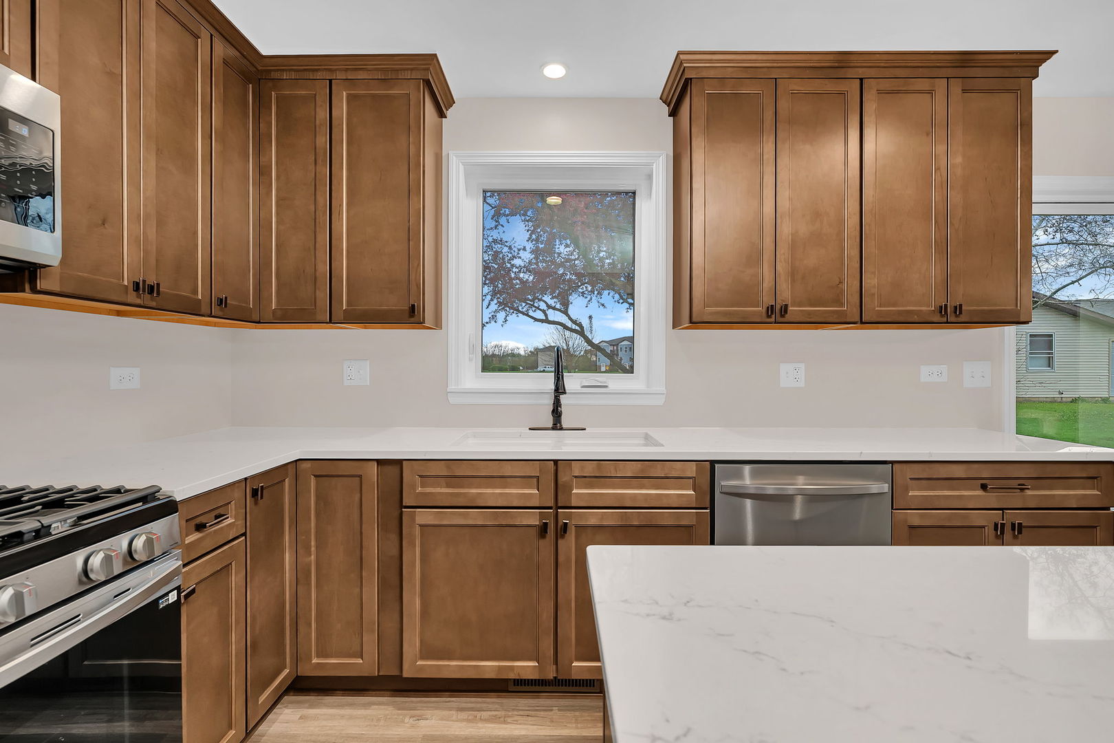 2380 Chestnut Lane Morris, IL 60450 - Photo 13 of 43 a kitchen with stainless steel appliances granite countertop a sink and a stove