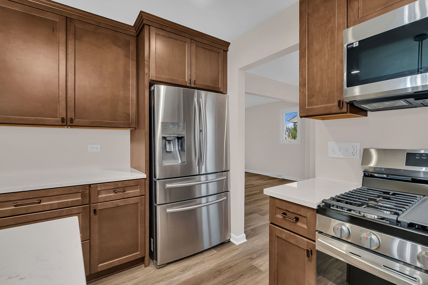 2380 Chestnut Lane Morris, IL 60450 - Photo 15 of 43 a kitchen with wooden cabinets and stainless steel appliances