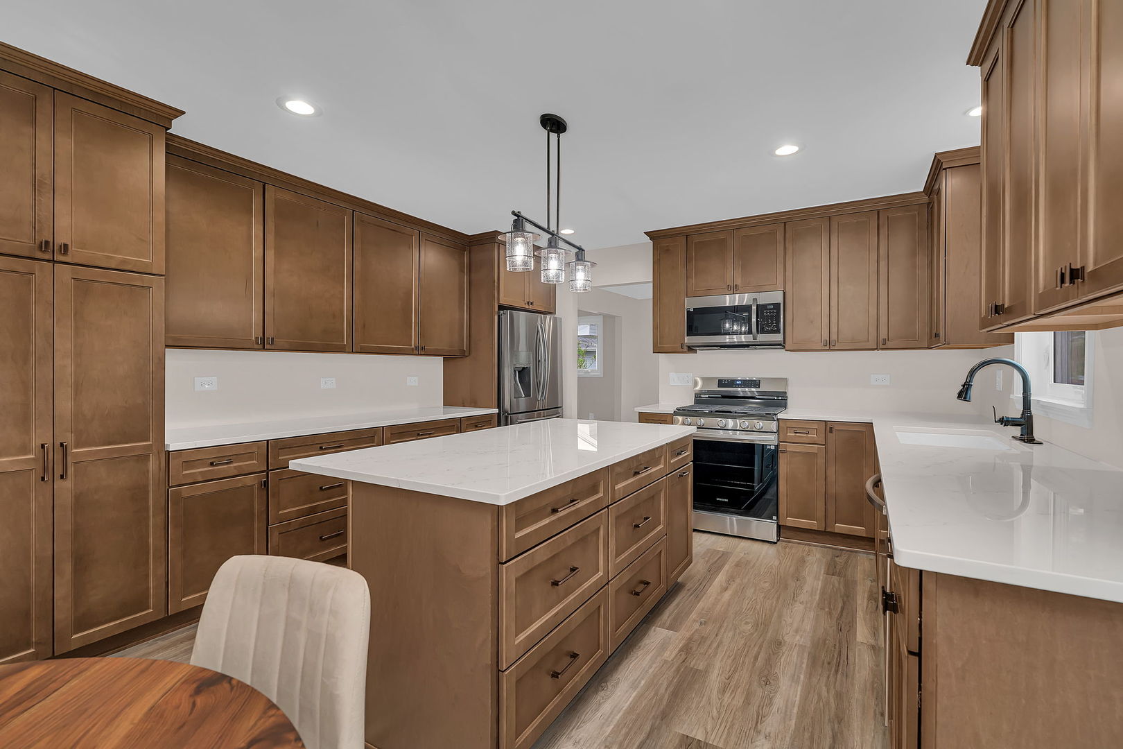 2380 Chestnut Lane Morris, IL 60450 - Photo 17 of 43 a kitchen with kitchen island a sink appliances and cabinets