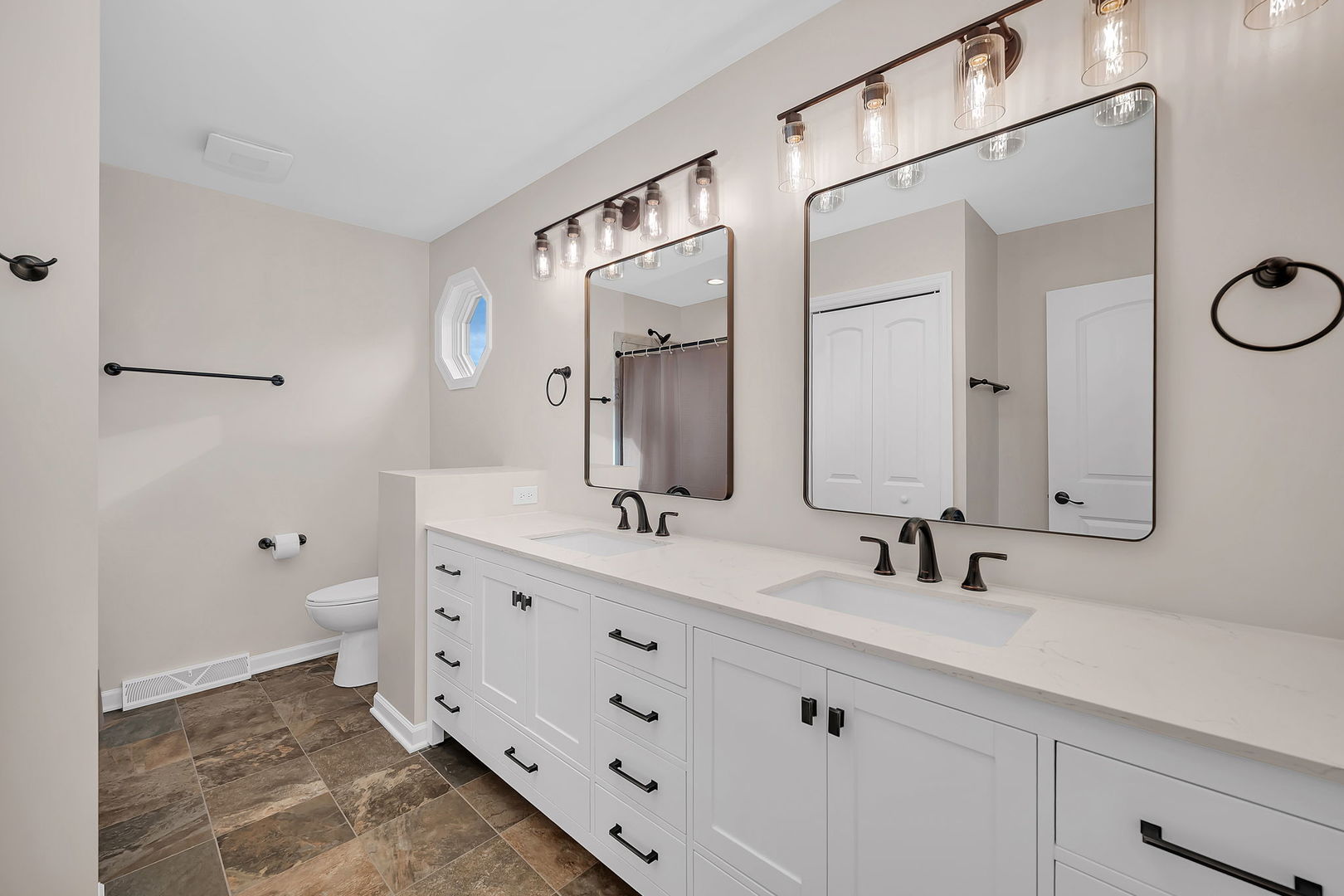 2380 Chestnut Lane Morris, IL 60450 - Photo 27 of 43 a bathroom with a double vanity sink mirror and toilet
