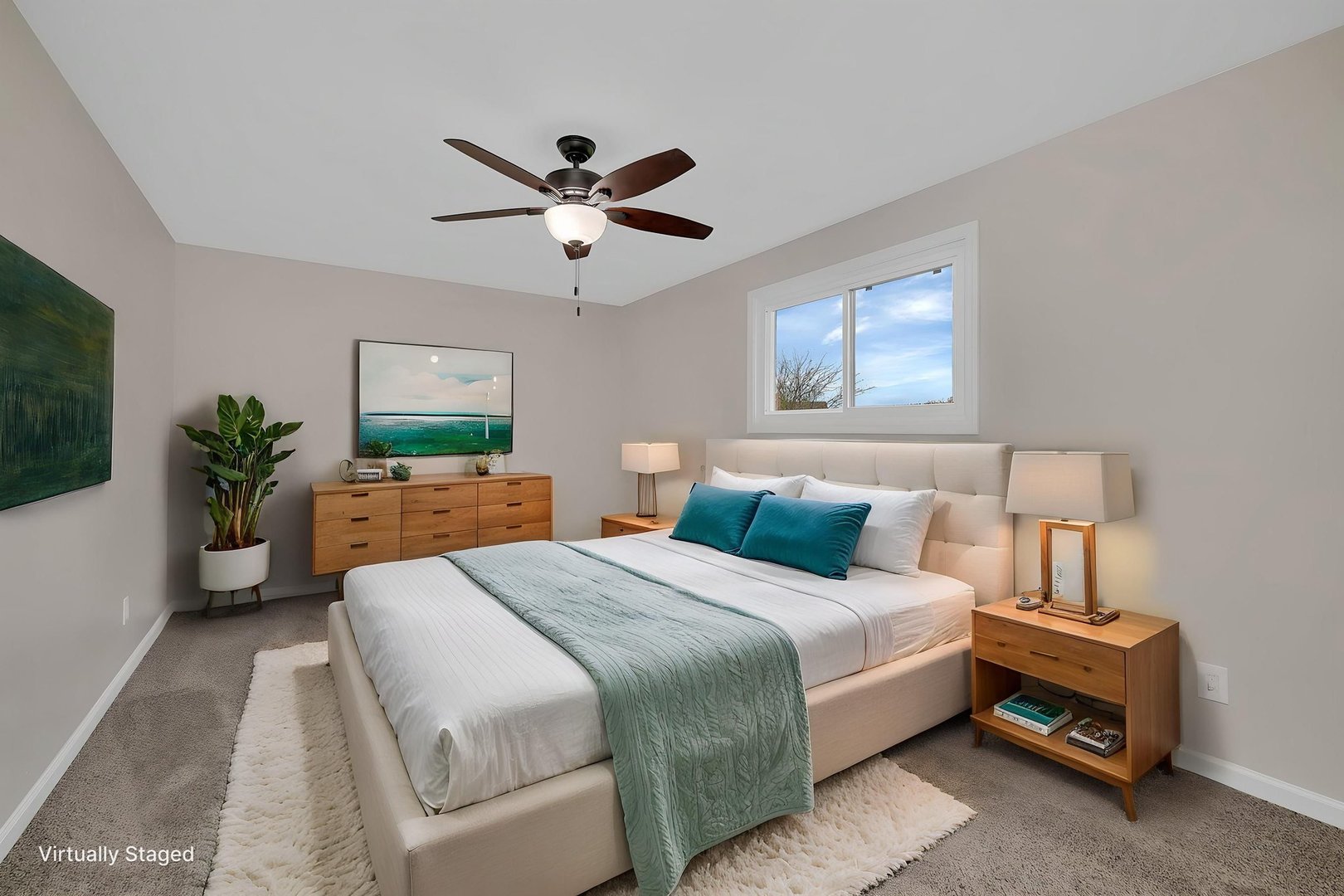 2380 Chestnut Lane Morris, IL 60450 - Photo 34 of 43 a spacious bedroom with a bed a couch and a potted plant