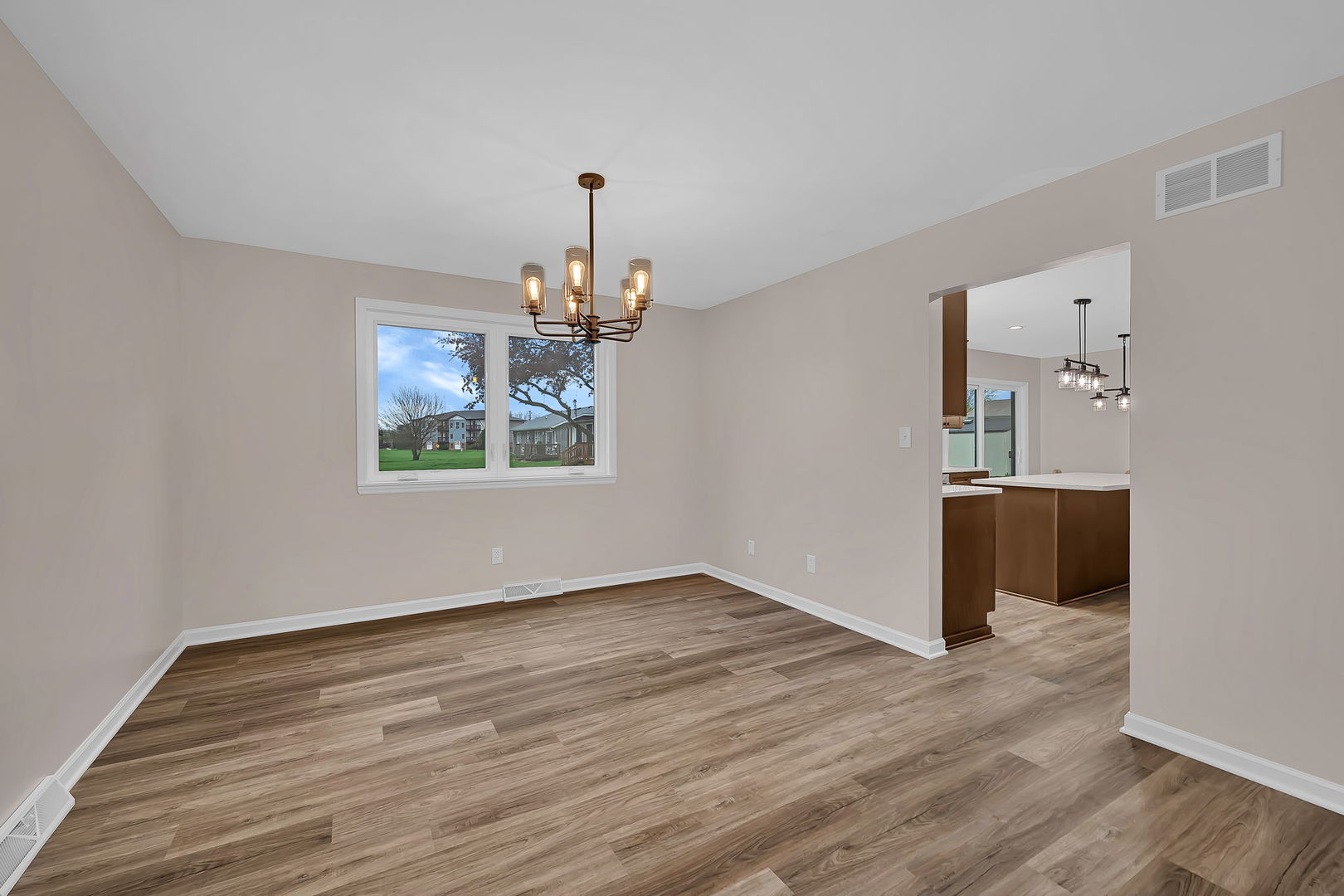 2380 Chestnut Lane Morris, IL 60450 - Photo 10 of 43 wooden floor in an empty room with a window