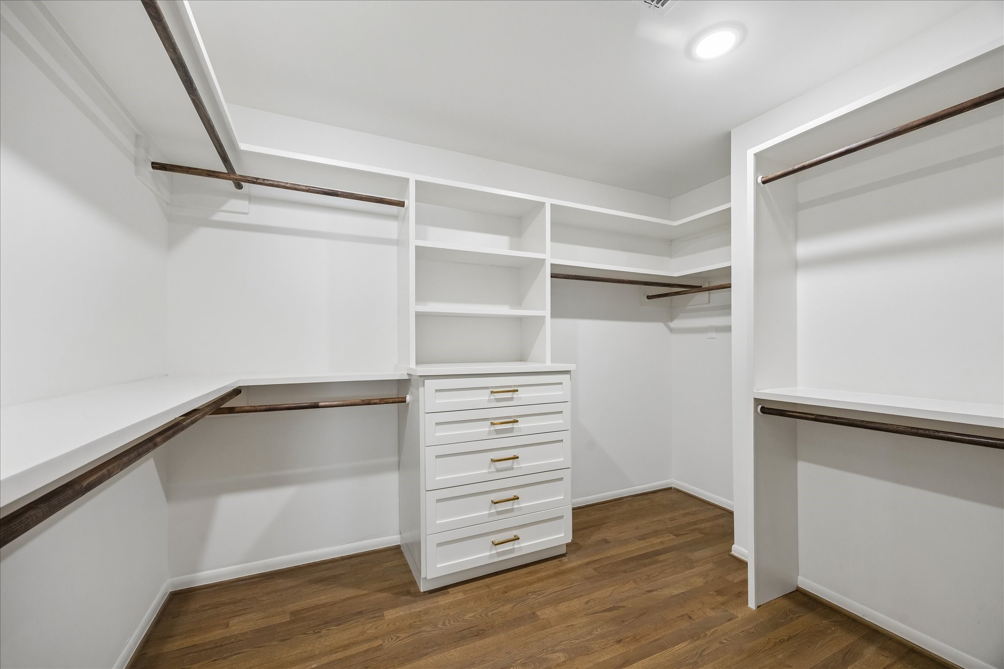 5698 Bayou Glen Road Houston, TX 77056 - Photo 21 of 30 Spacious walk-in closet with shelving, drawers and an abundance of hanging space.