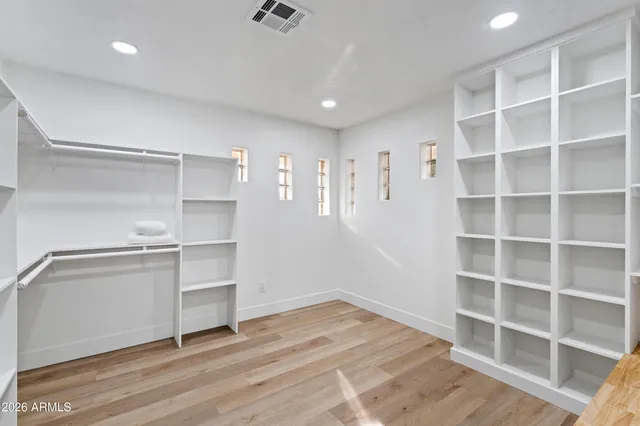 a view of an empty walk in closet