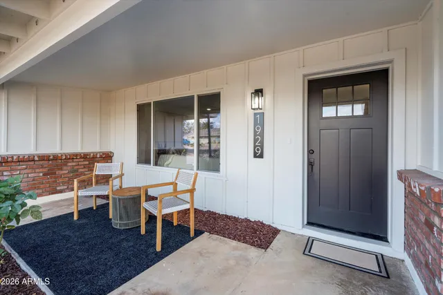 a living room with a rug