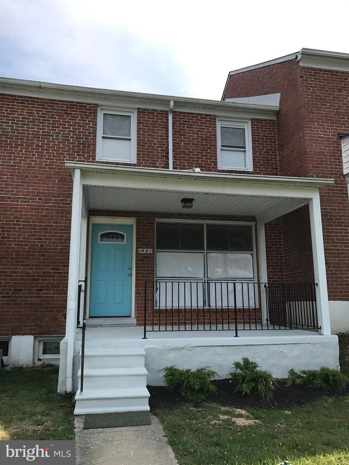 1441 Walker Avenue Baltimore, MD 21239 - Photo 15 of 28 a front view of a house