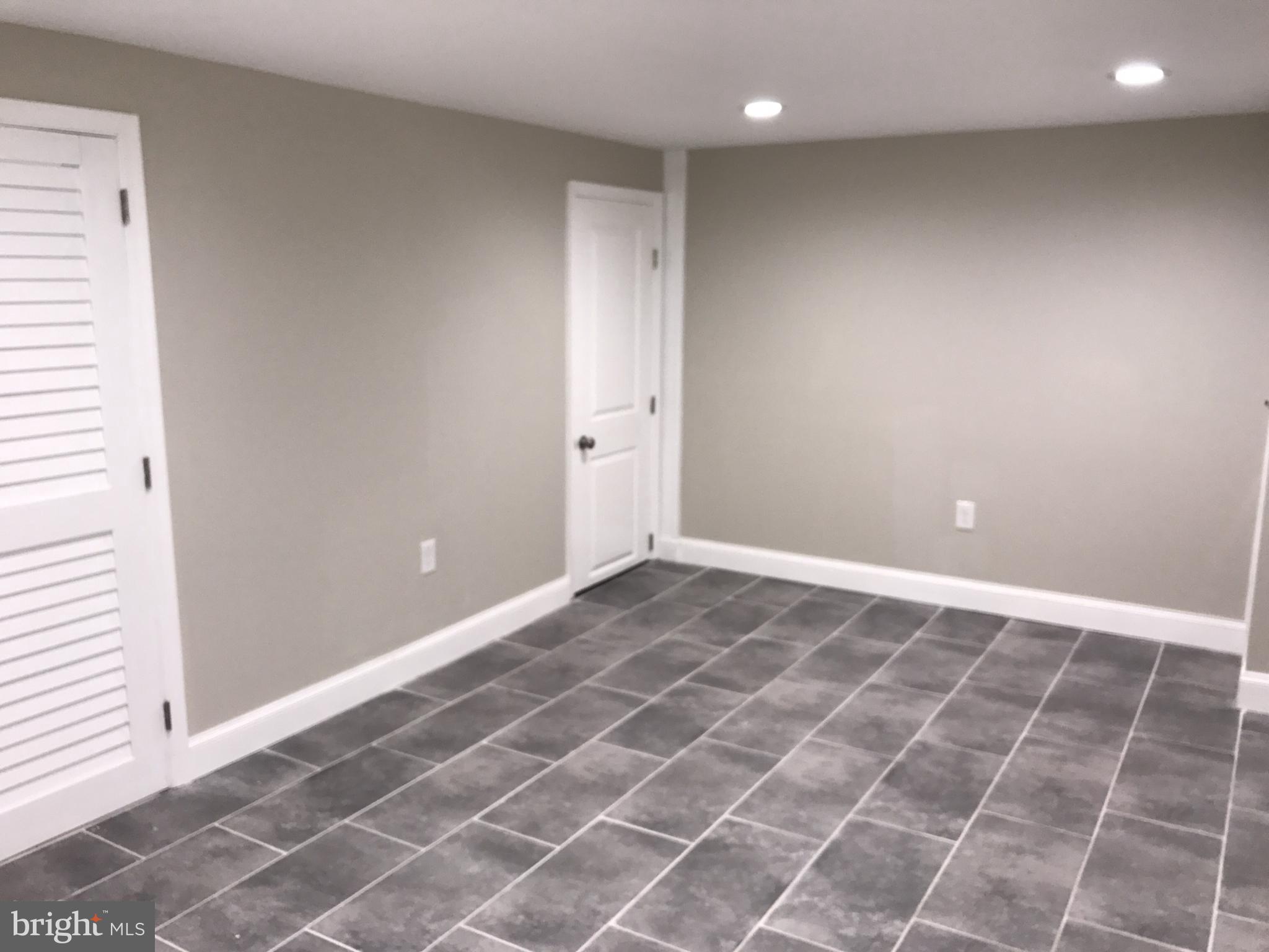 1441 Walker Avenue Baltimore, MD 21239 - Photo 18 of 28 a view of an empty room