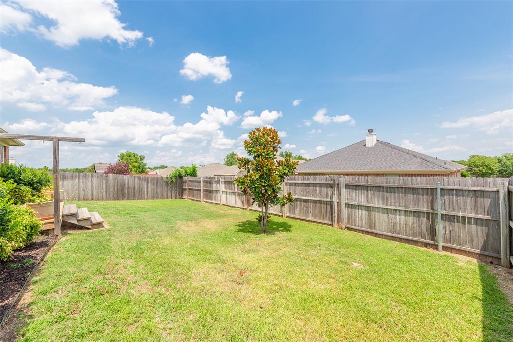 202 Whitestone Way Weatherford, TX 76085 - Photo 31 of 35 a view of a backyard of the house