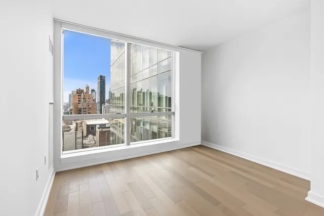 a view of a balcony with city view