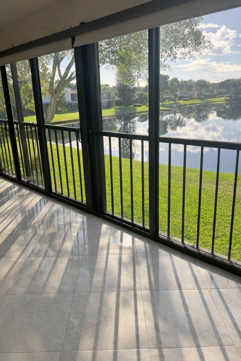 21851 Arriba Real, Unit L Boca Raton, FL 33433 - Photo 12 of 26 a view of a large window with an outdoor space