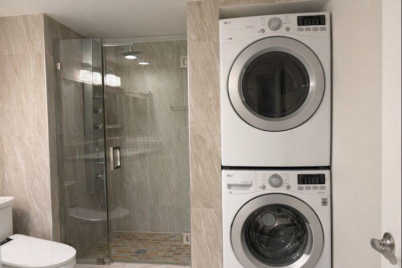 21851 Arriba Real, Unit L Boca Raton, FL 33433 - Photo 22 of 26 a bathroom with a toilet and a sink