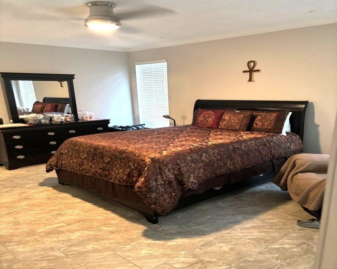 3207 Georgia Pine Drive Spring, TX 77373 - Photo 9 of 29 a bedroom with a bed and window