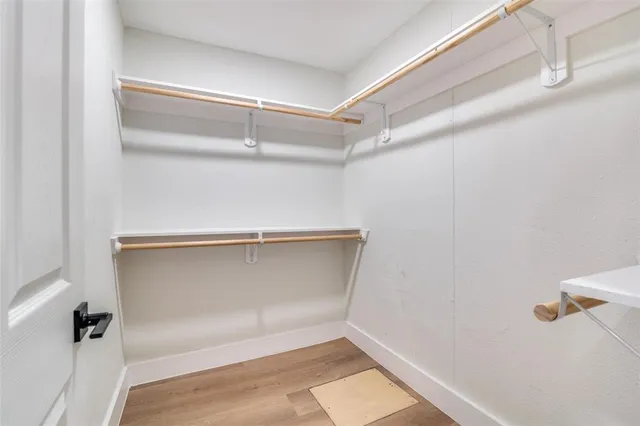 a view of a room with racks on the wall