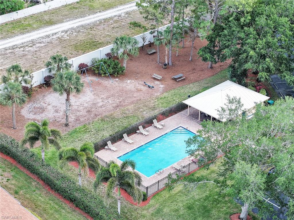 586 Crossfield Circle Naples, FL 34104 - Photo 38 of 38 an aerial view of a house with a yard
